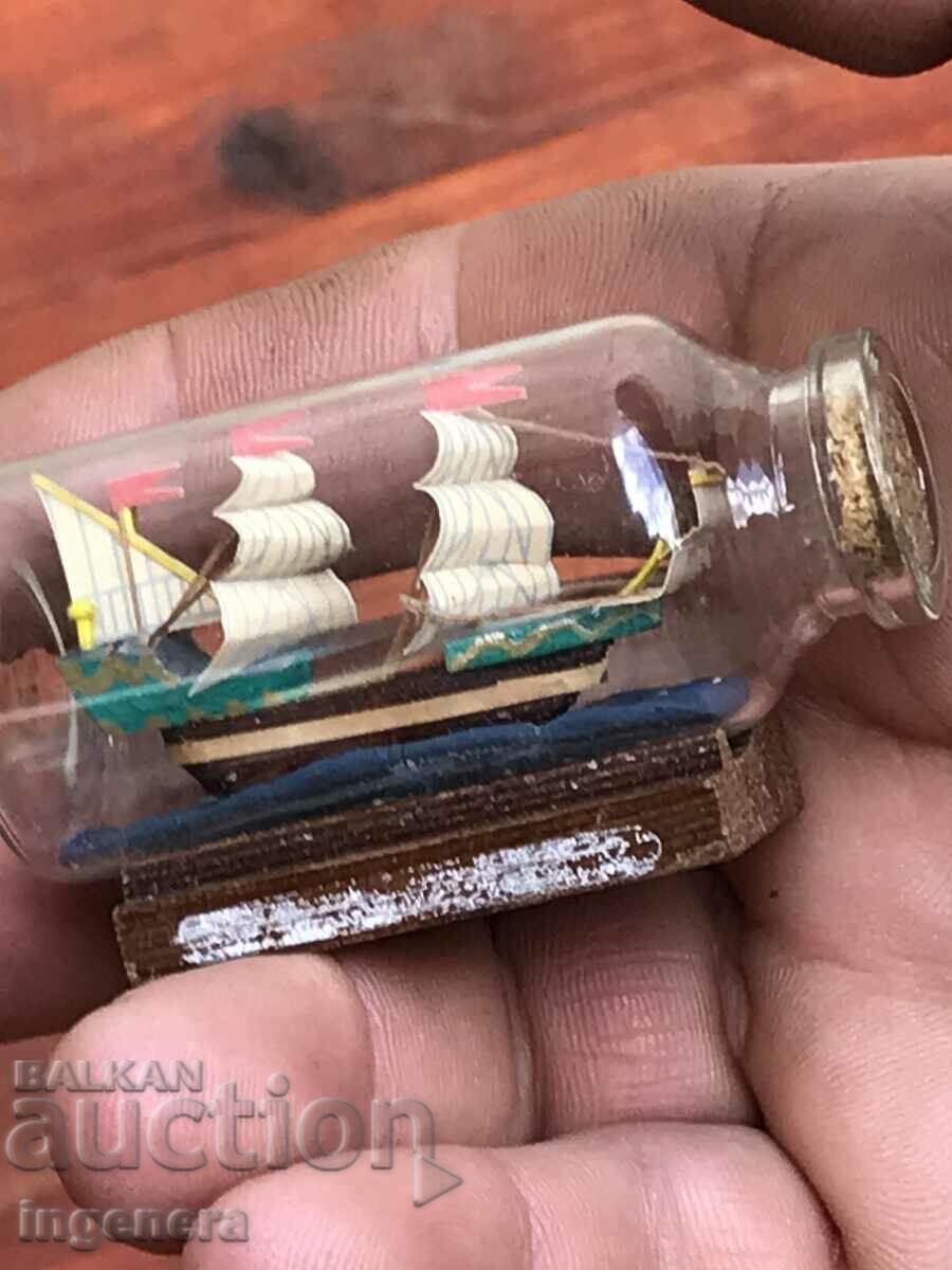SOUVENIR SHIP MOUNTED IN GLASS BOTTLE STAND UNIQUE