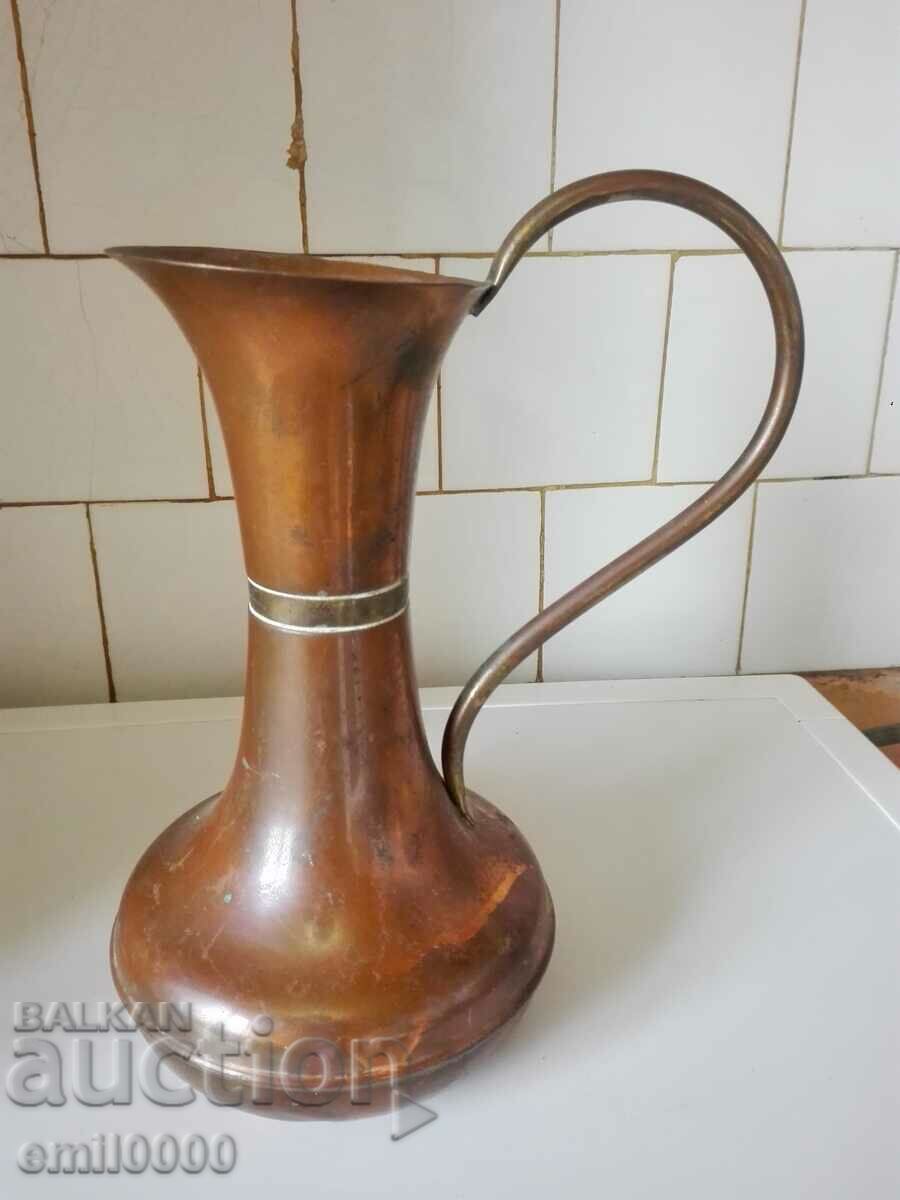 A beautiful, large copper jug.