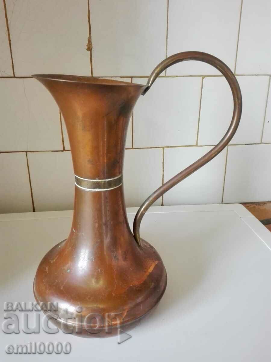 A beautiful, large copper jug. A beautiful, large copper jug.