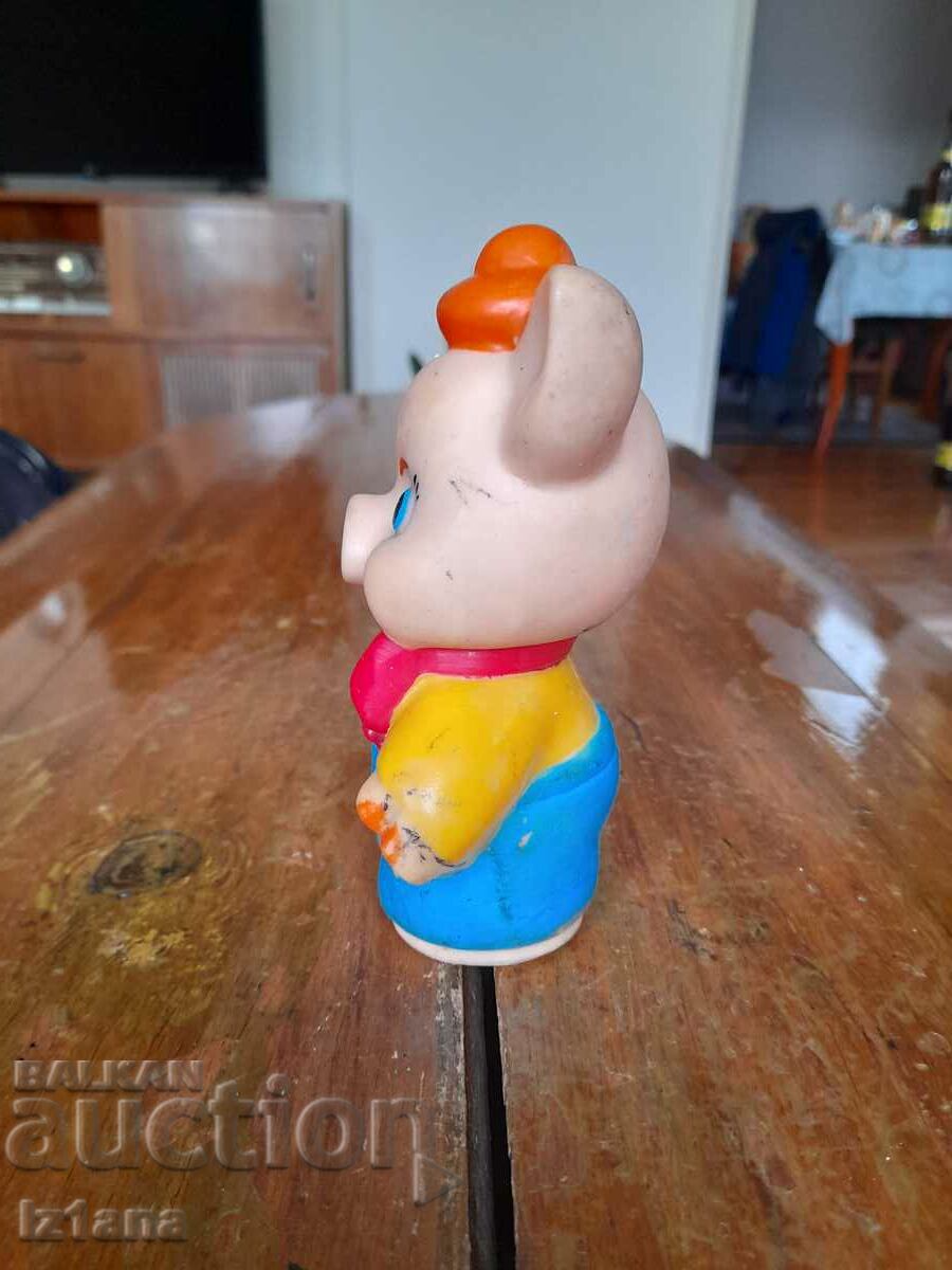 Delivery of Old rubber toy pig