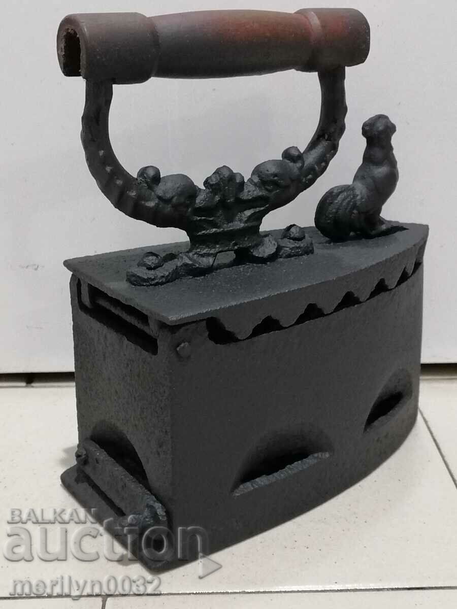 Auction An old iron on fire Auction An old iron on fire