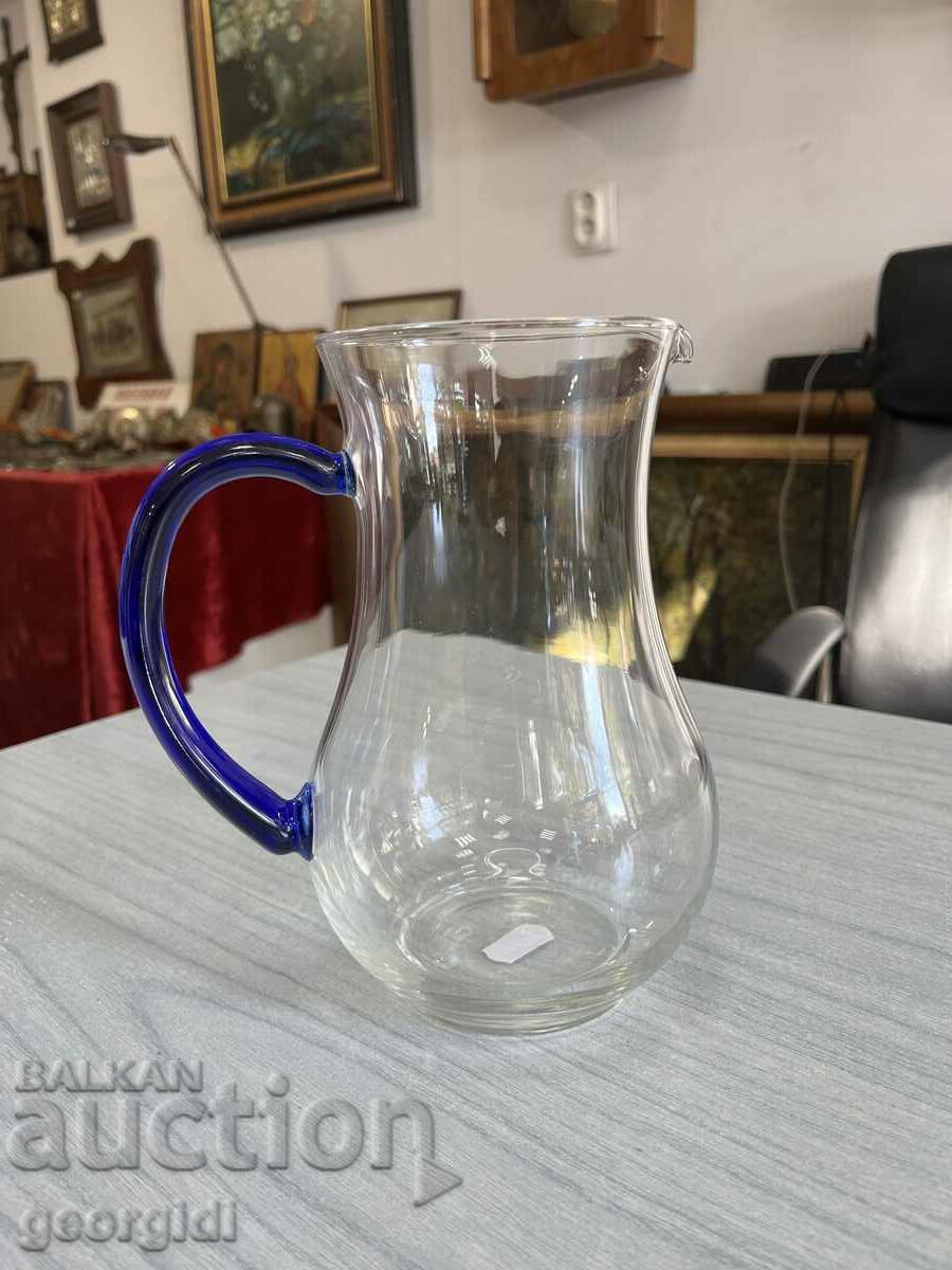 ART glass jug with blue handle. #4647