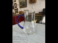 ART glass jug with blue handle. #4647