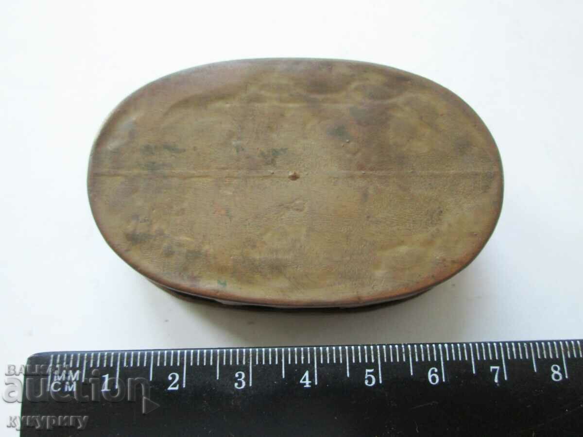 A small elliptical copper box with folk motifs with price 40.00 BGN | € 20.45 A small elliptical copper box with folk motifs with price 40.00 BGN | € 20.45