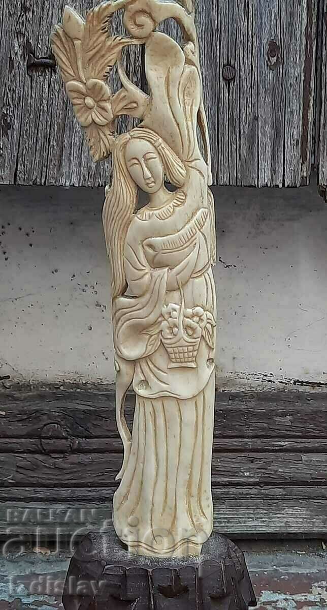 Finely carved bone figure