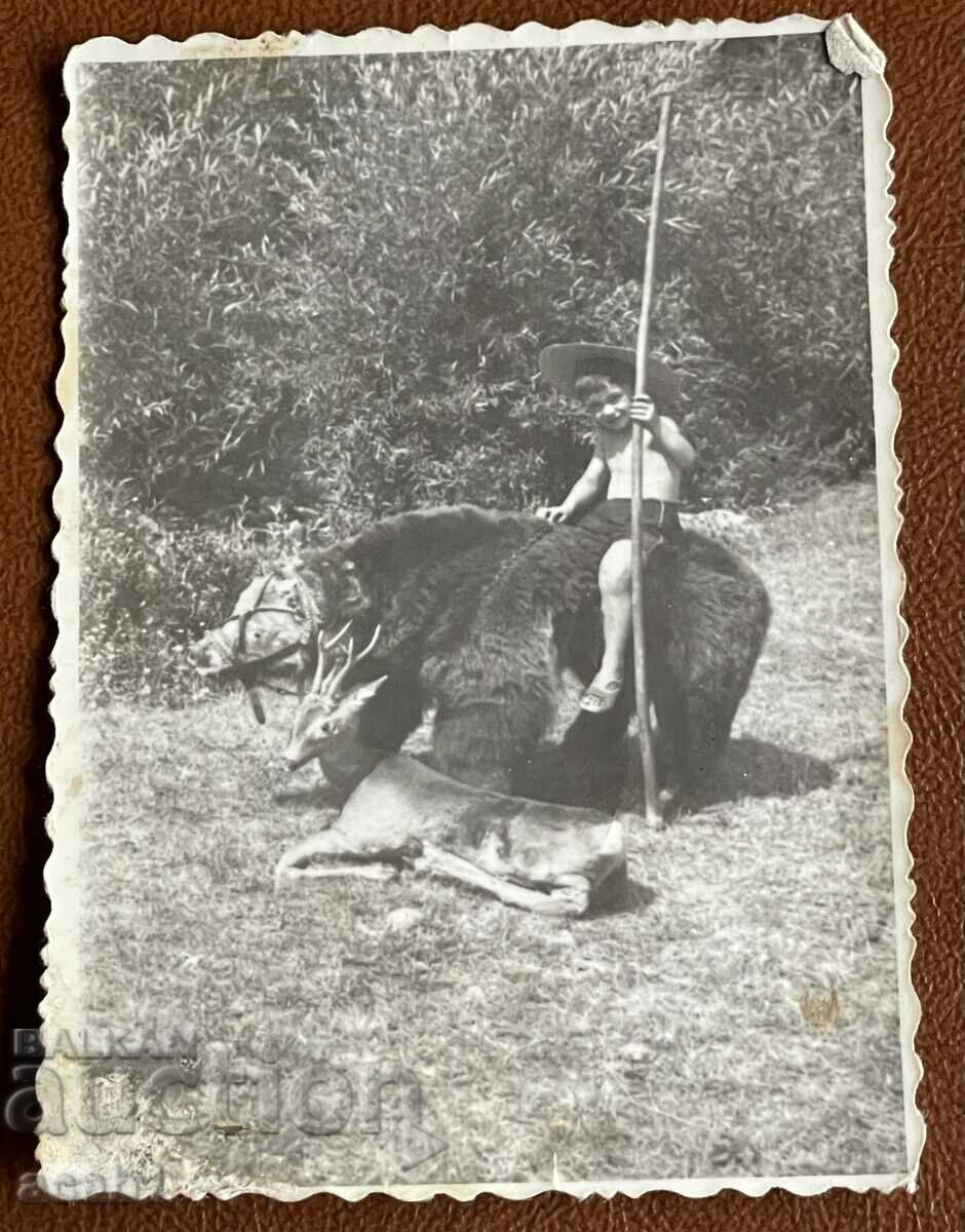 Child on Bear next to Roe