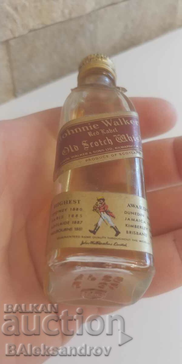 Auction Unwrapped mini bottle for collection Auction Unwrapped mini bottle for collection