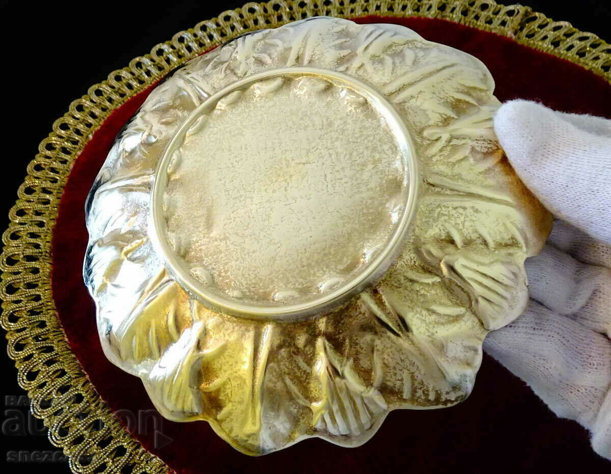 Delivery of Bronze plate with embossed petals. Delivery of Bronze plate with embossed petals.