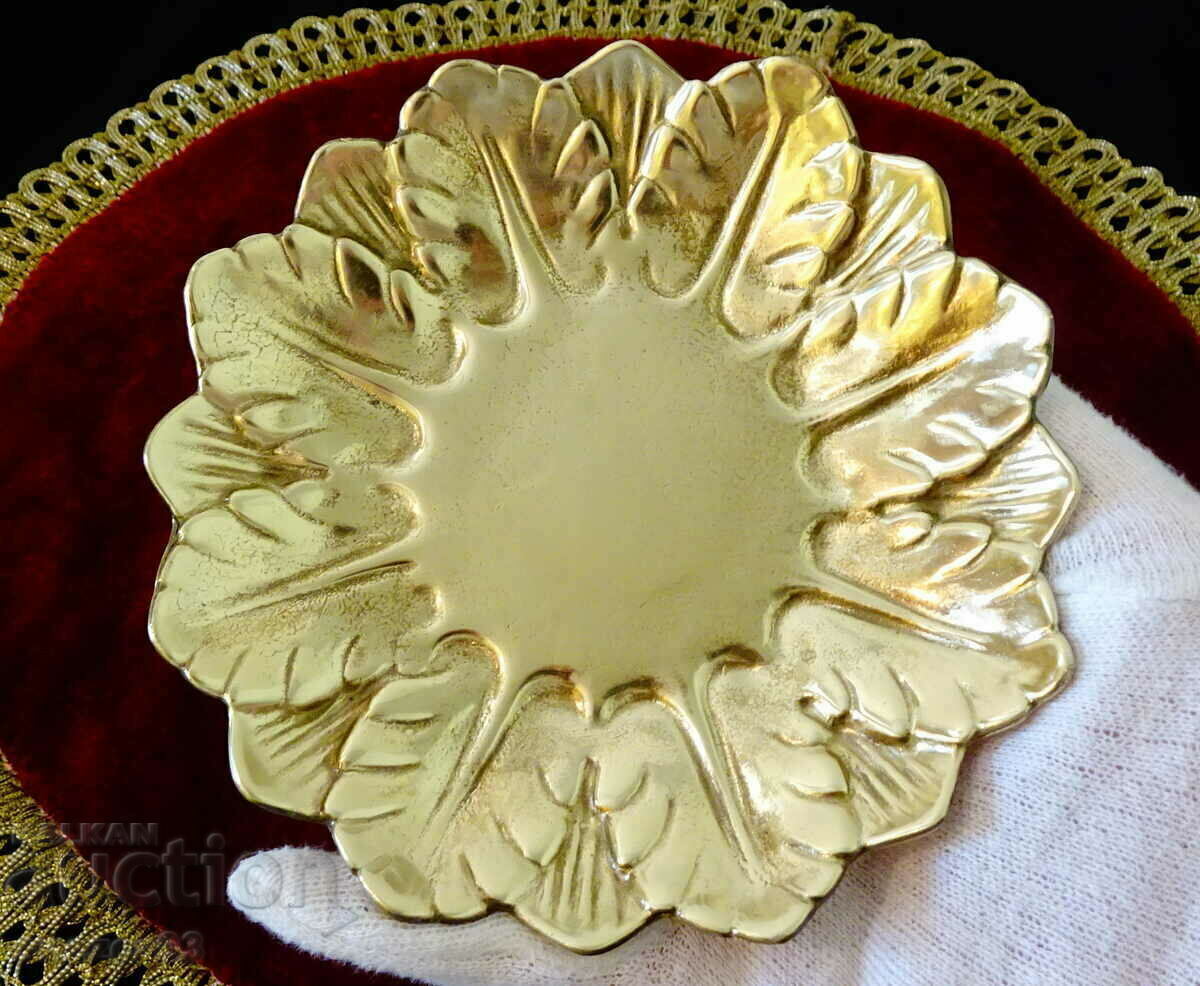 Bronze plate with embossed petals. Bronze plate with embossed petals.