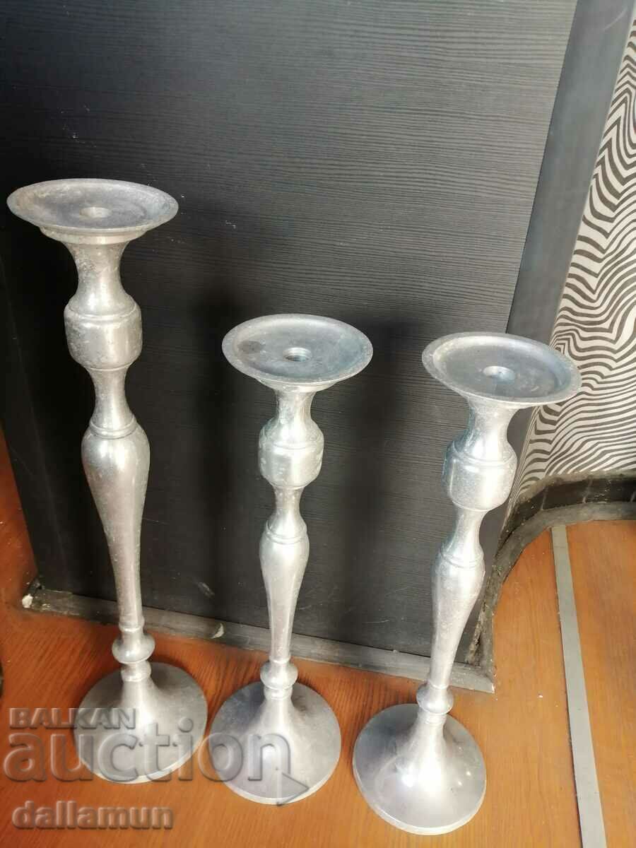 set of aluminum candlesticks
