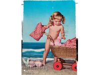 Card vintage girl on the beach Belgium stamp