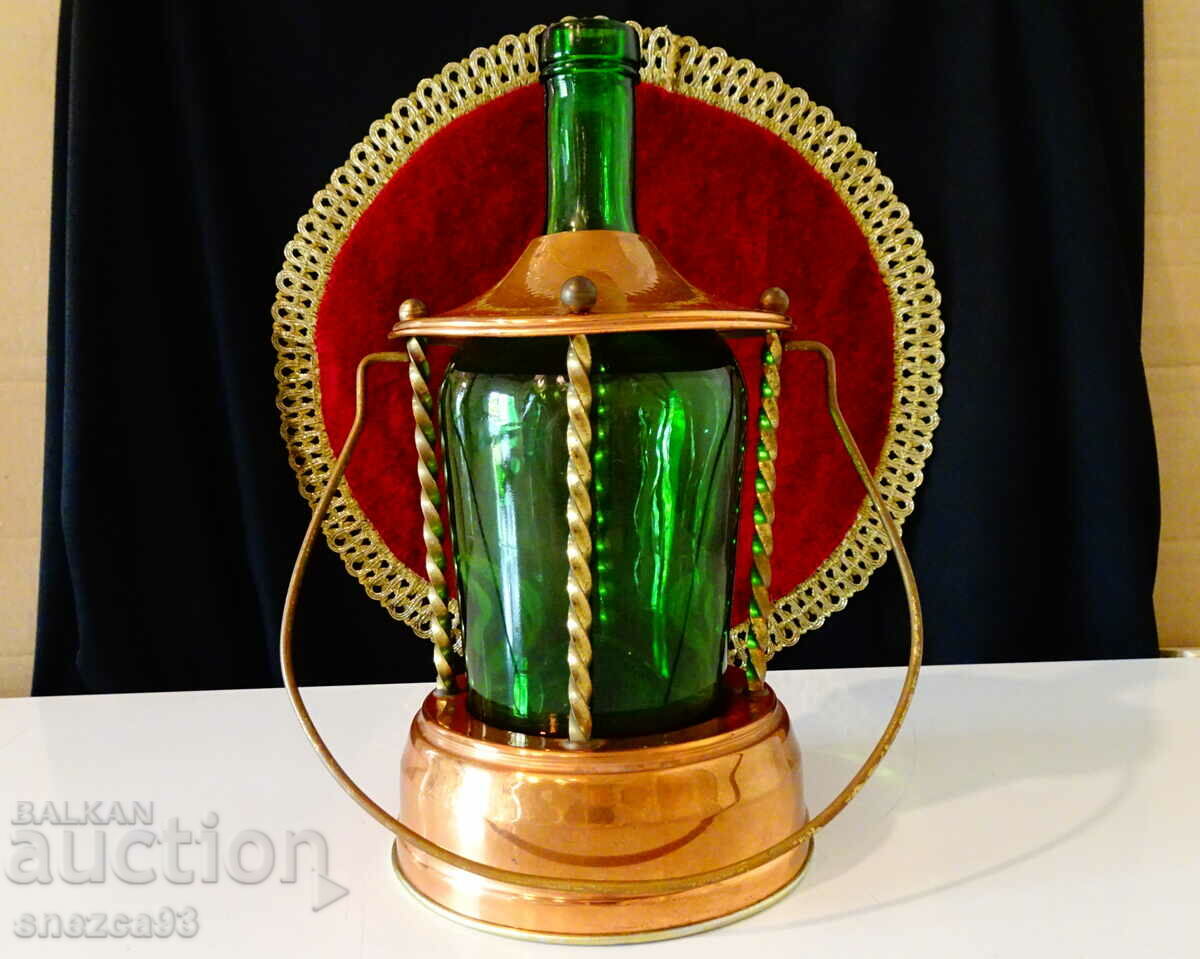 Copper bottle holder with Swiss lantern Reuge, lantern.