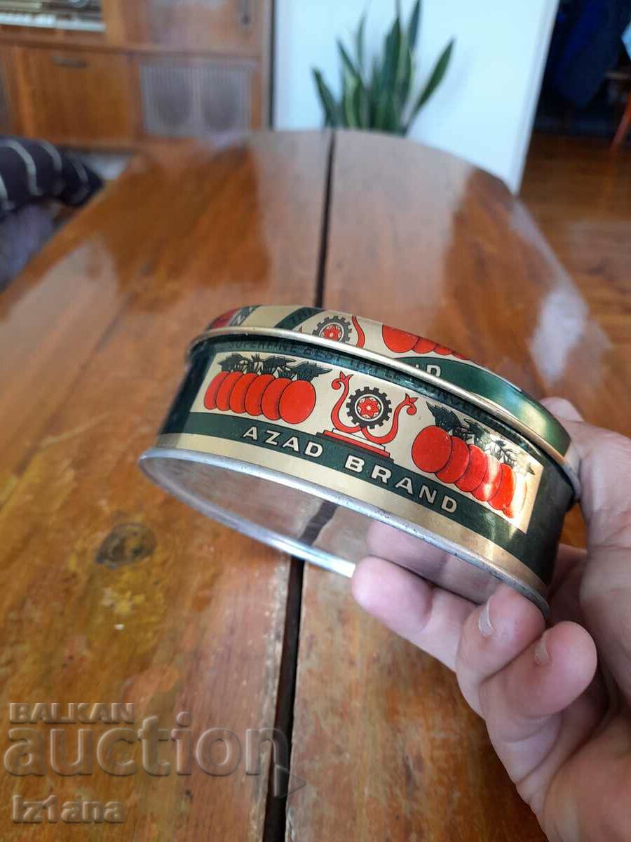 Auction  An old tin of tomato puree