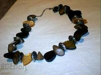 old beautiful necklace of natural stones