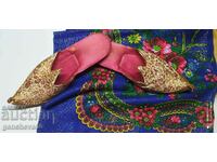 Old Turkish slippers and a new headscarf