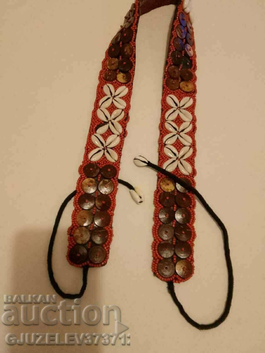 Old belt with beads, shells, fashion accessory from Tibet