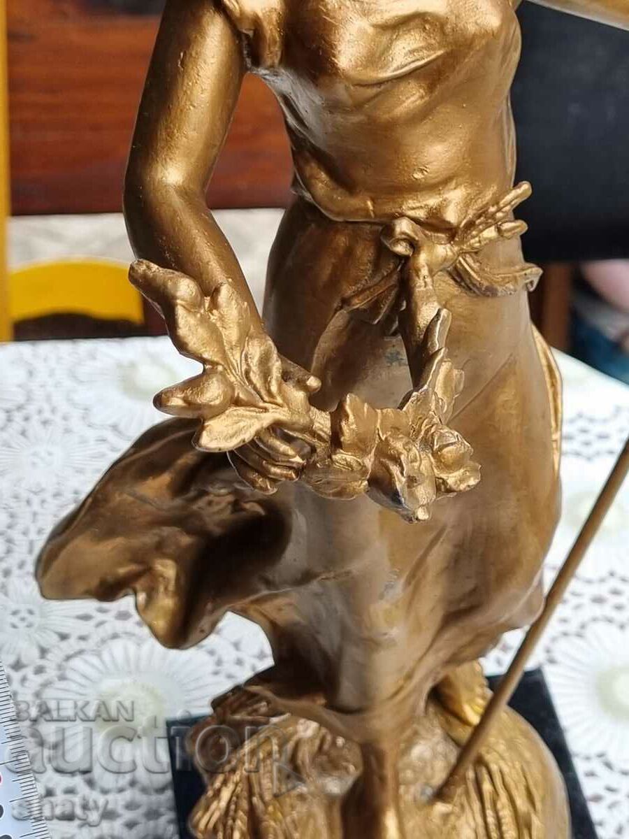 Delivery of Old sculpture. Metal figure