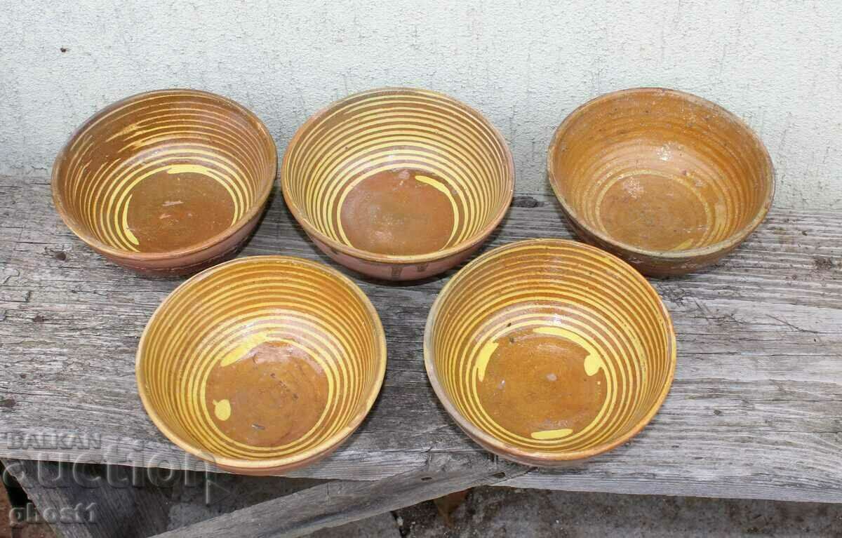 Old clay pans, handmade bowls