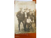 Old photo of a man, boy, bicycle, before 1945