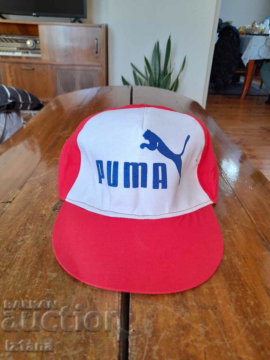 Pălărie veche Puma, Puma
