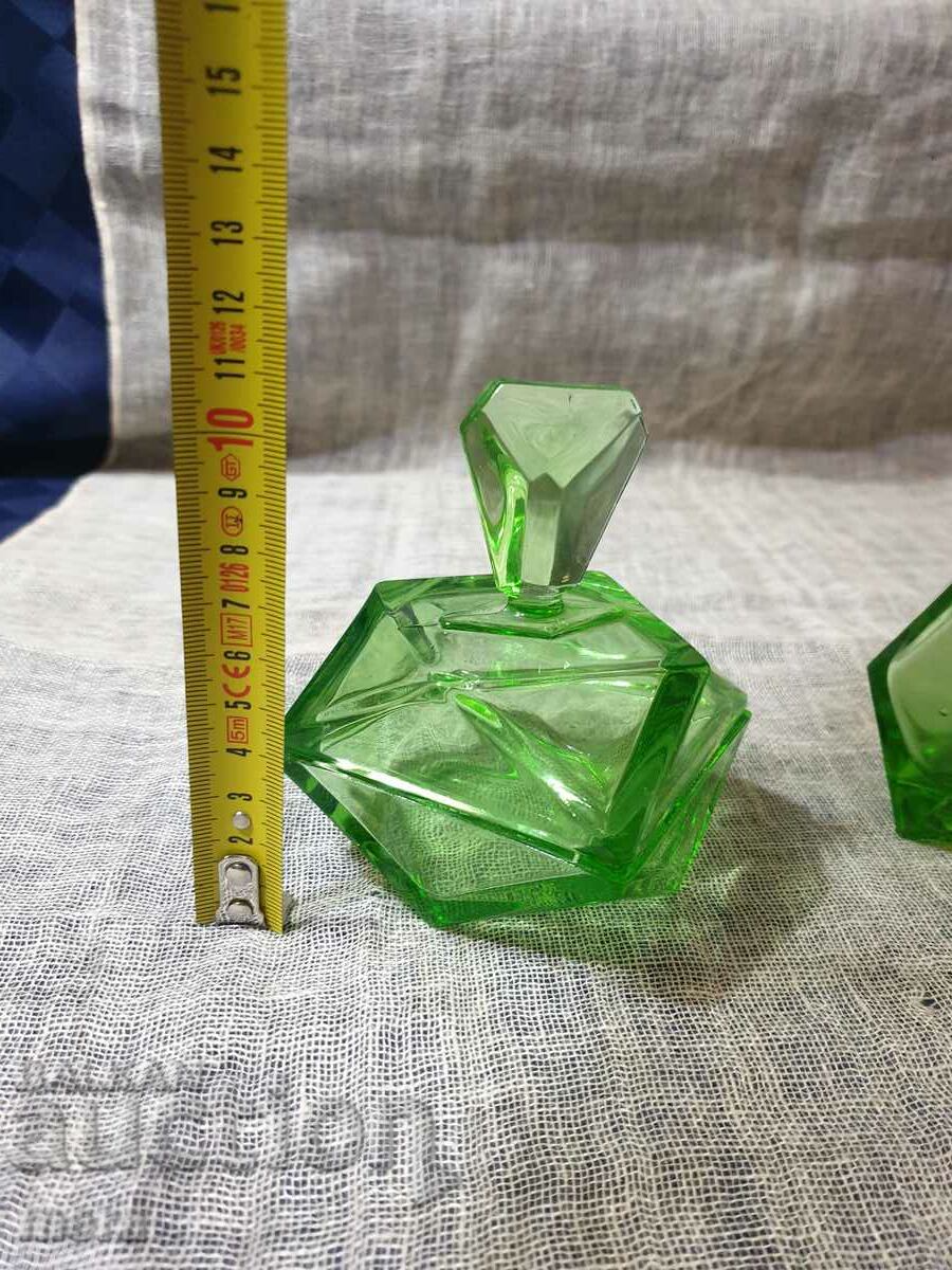 Auction Lot of colored glass vessels Auction Lot of colored glass vessels