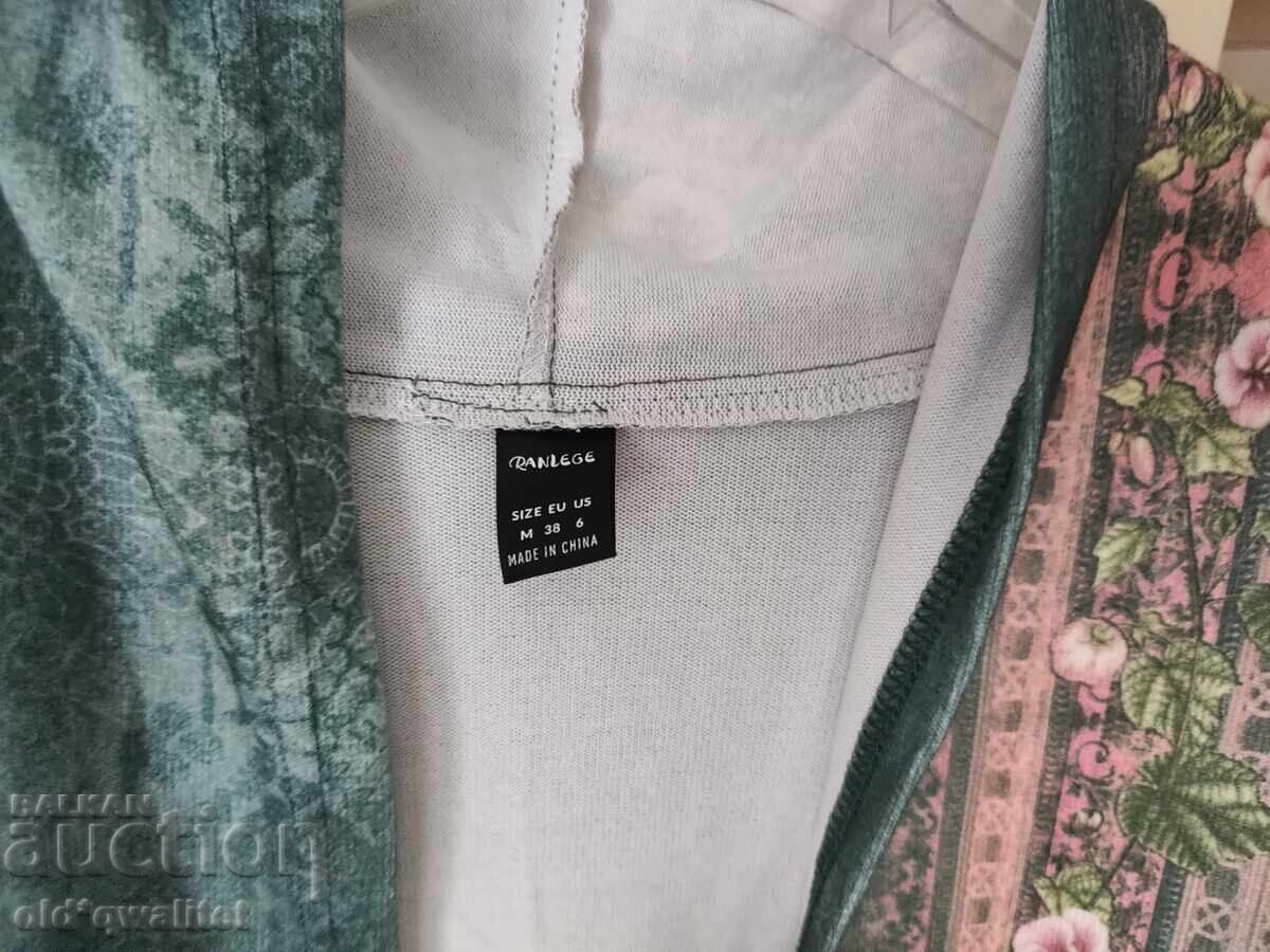 Delivery of Attractive women's cardigan, like a colorful garden