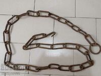 Old forged chain with hook, chain link chain