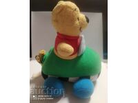 Winnie the Pooh with a car, the tail pulls and goes