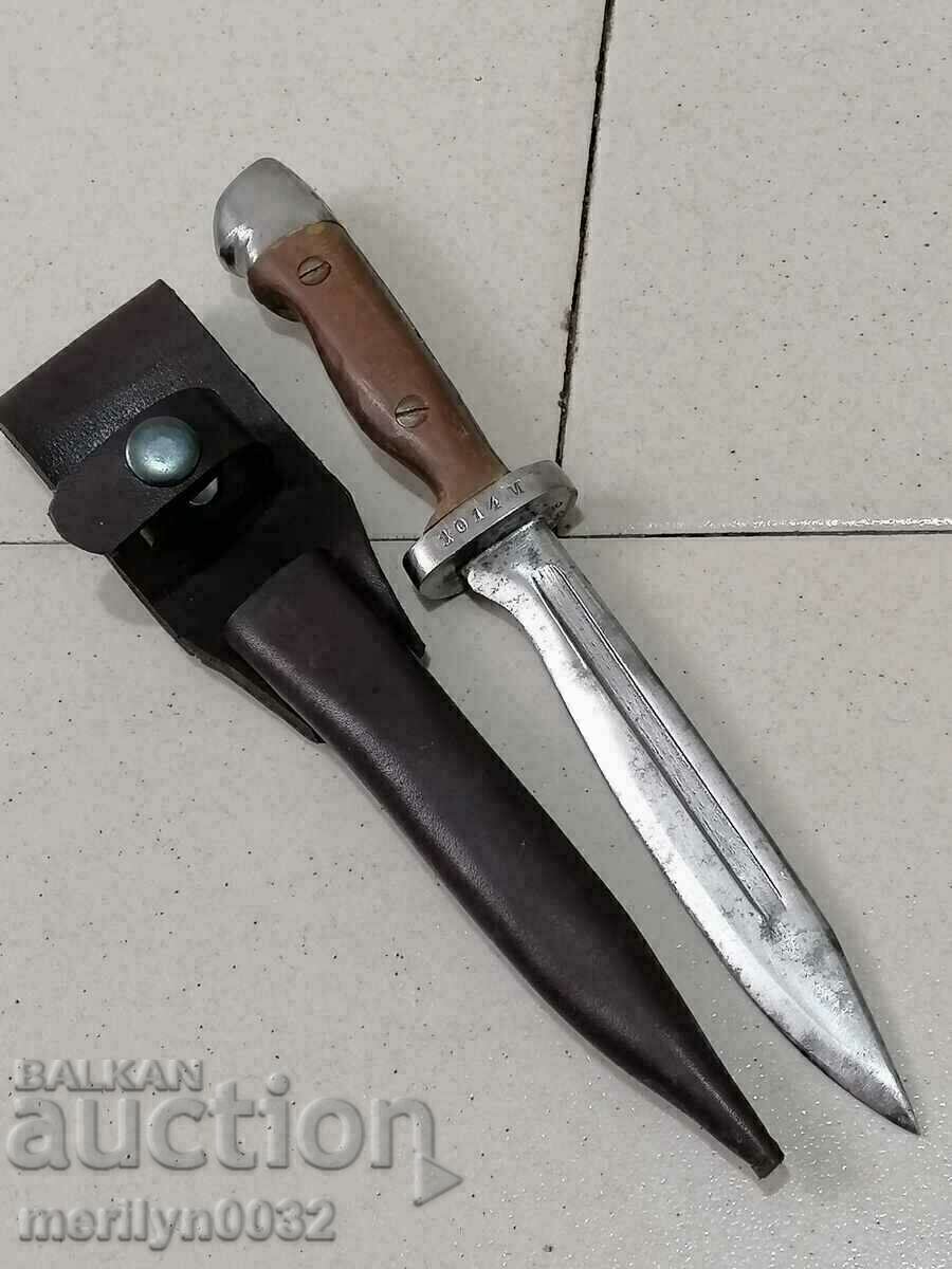 Auction Combat knife with military number plate, baked bakelite Auction Combat knife with military number plate, baked bakelite