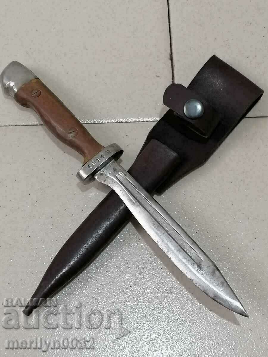 Combat knife with military number plate, baked bakelite