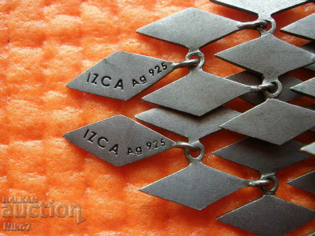 Delivery of Spectacular, silver, designer earrings - IZCA. Delivery of Spectacular, silver, designer earrings - IZCA.
