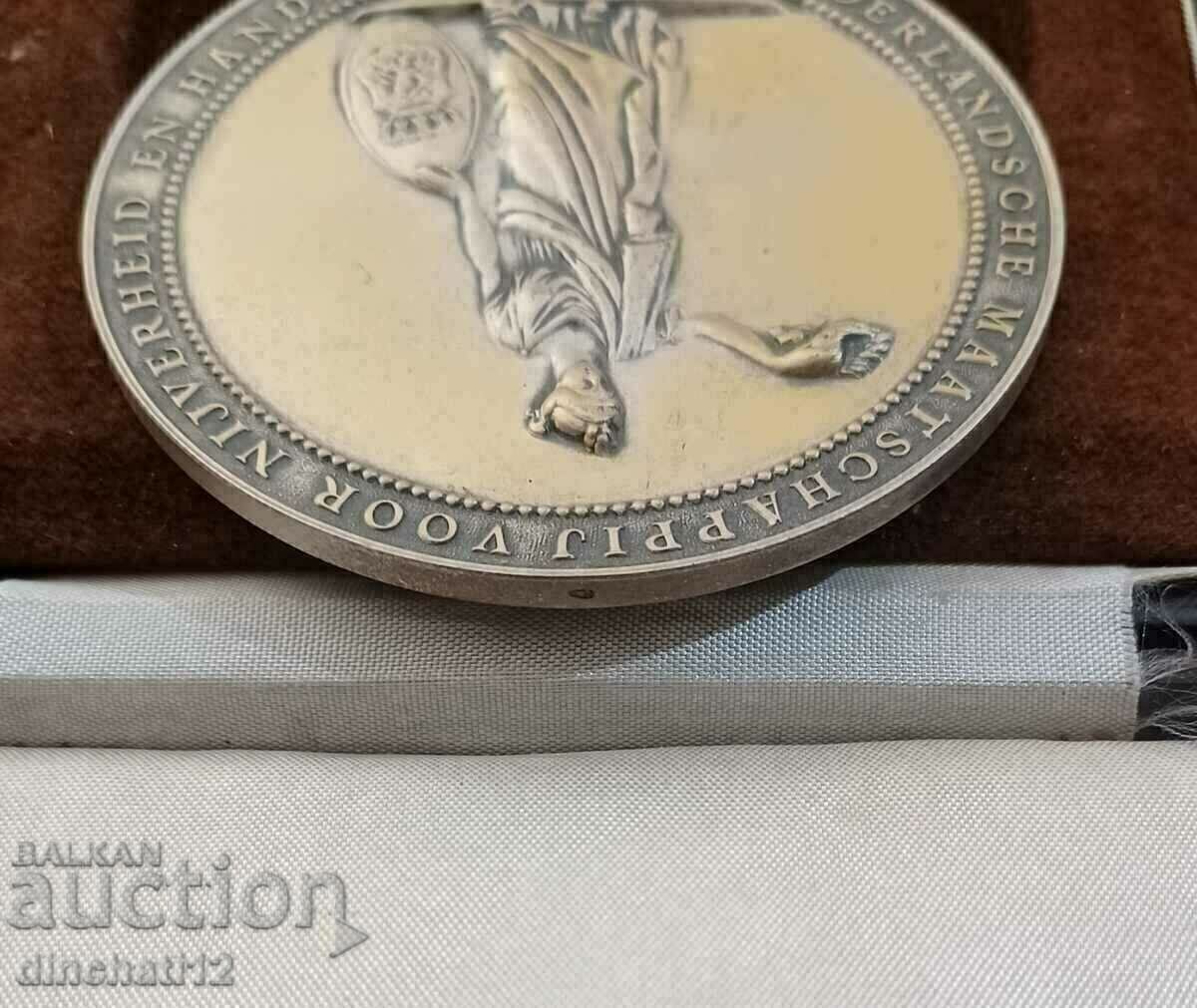 Delivery of SILVER. Netherlands Society for Industry and Commerce Delivery of SILVER. Netherlands Society for Industry and Commerce
