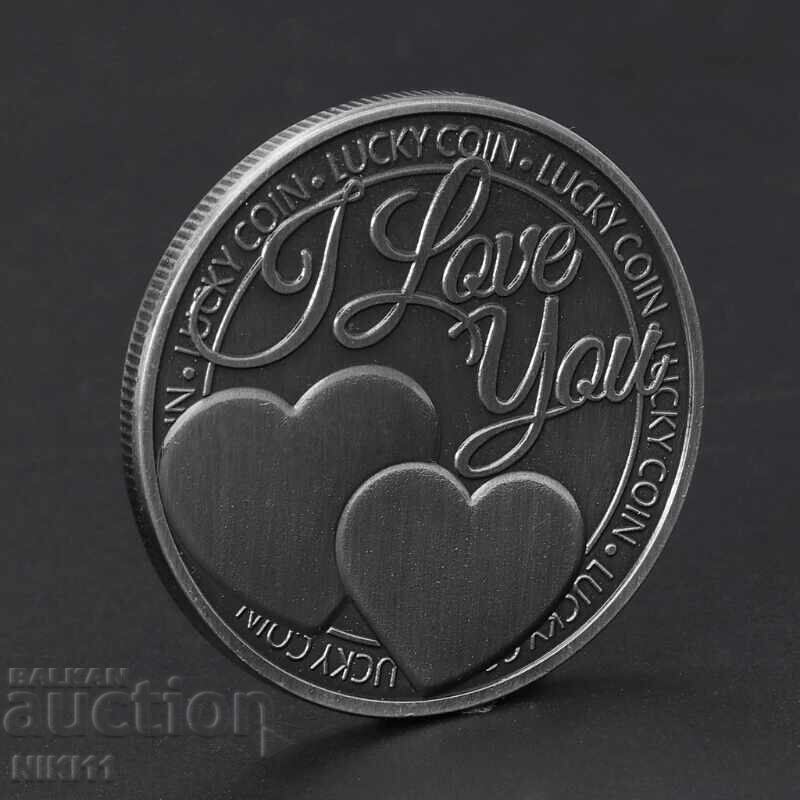 Monedă cu inscripția „Te iubesc” cu inimă și trifoi, inimioare