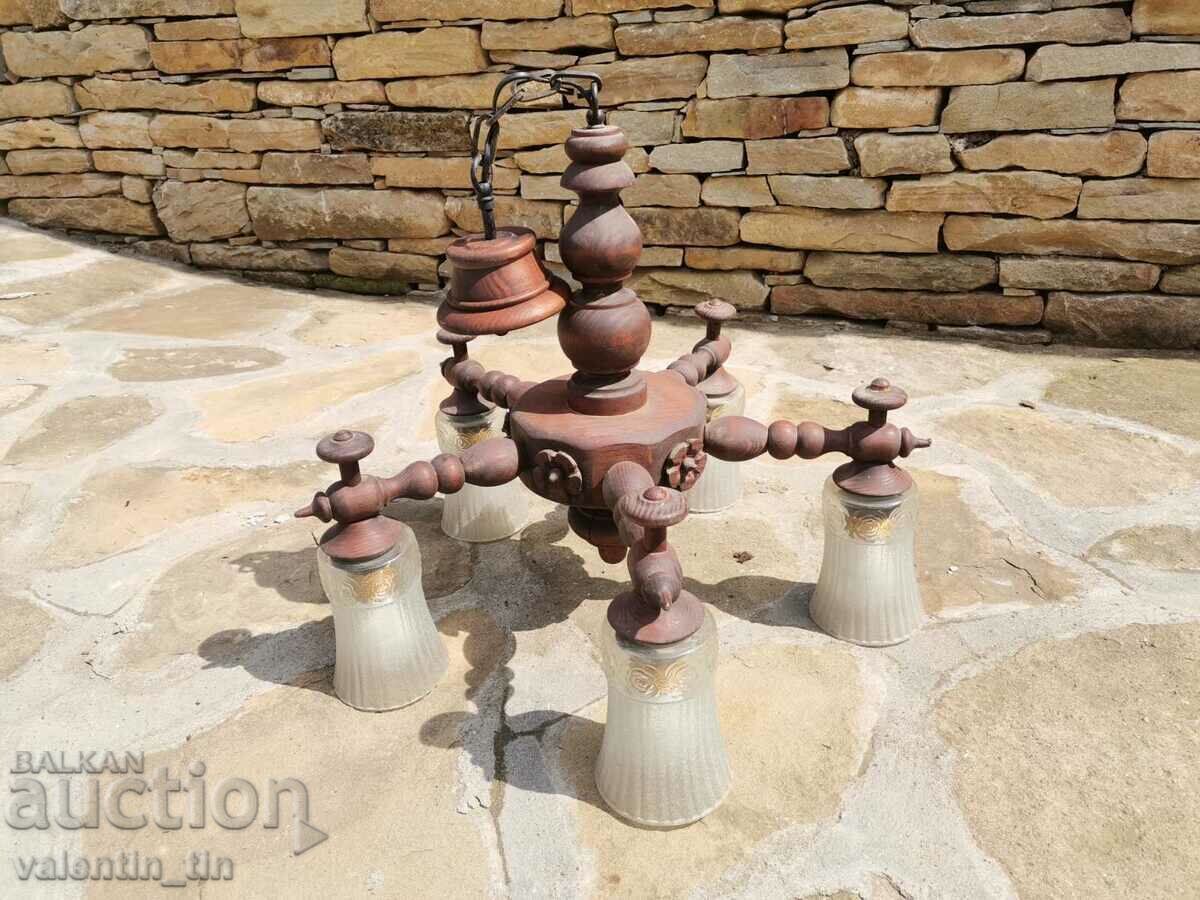 Old chandelier, lampshade made of turned wood Old chandelier, lampshade made of turned wood