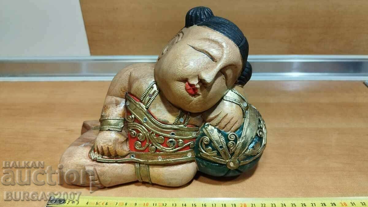 Old wooden figure, geisha