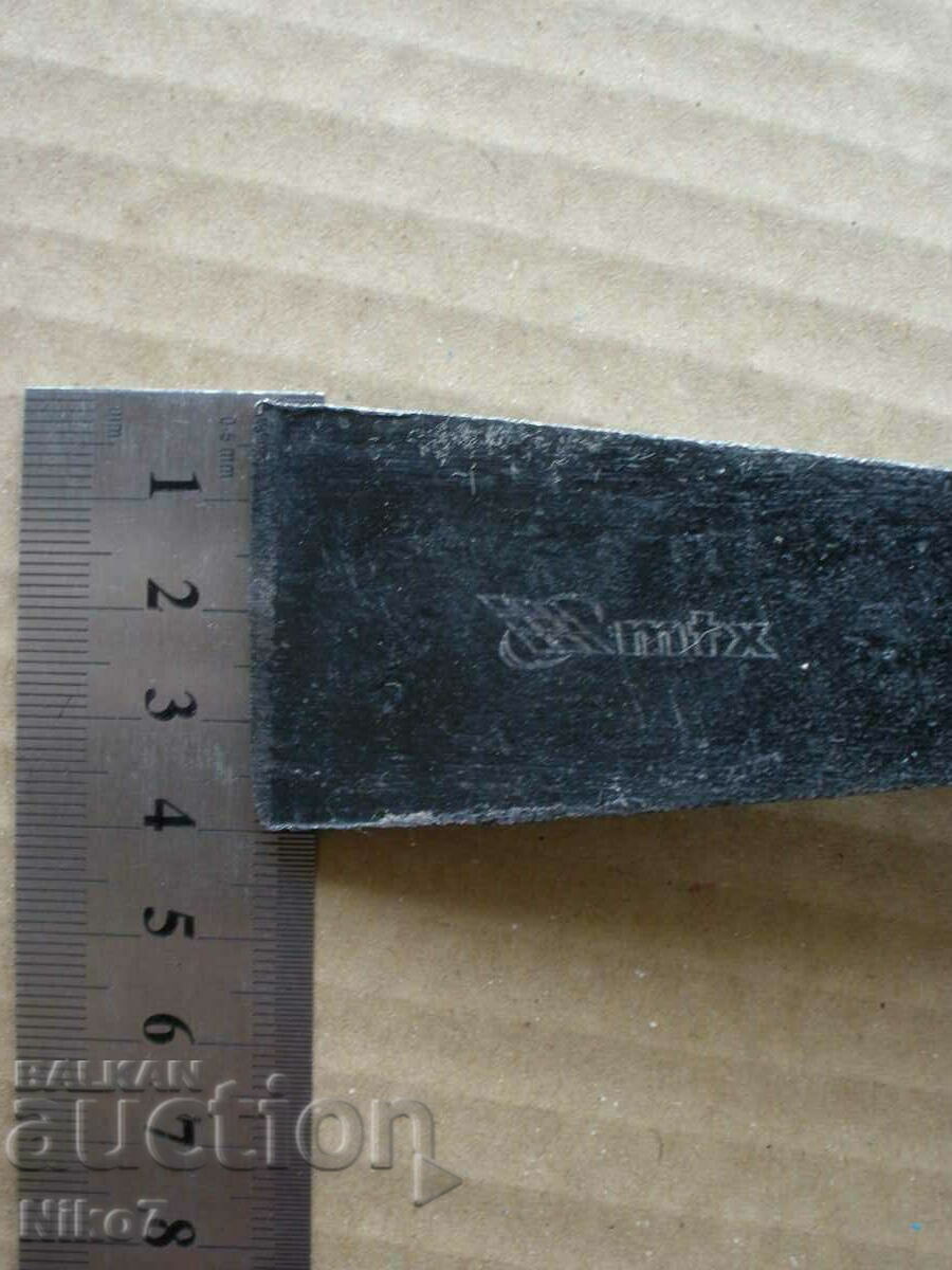 A small, branded pickaxe. - 7