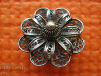 Antique silver filigree brooch.