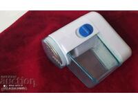 Aparat de curățat scame de pe haine