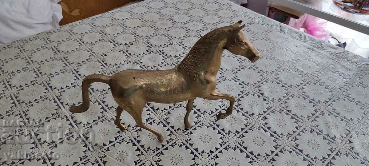 A large brass horse