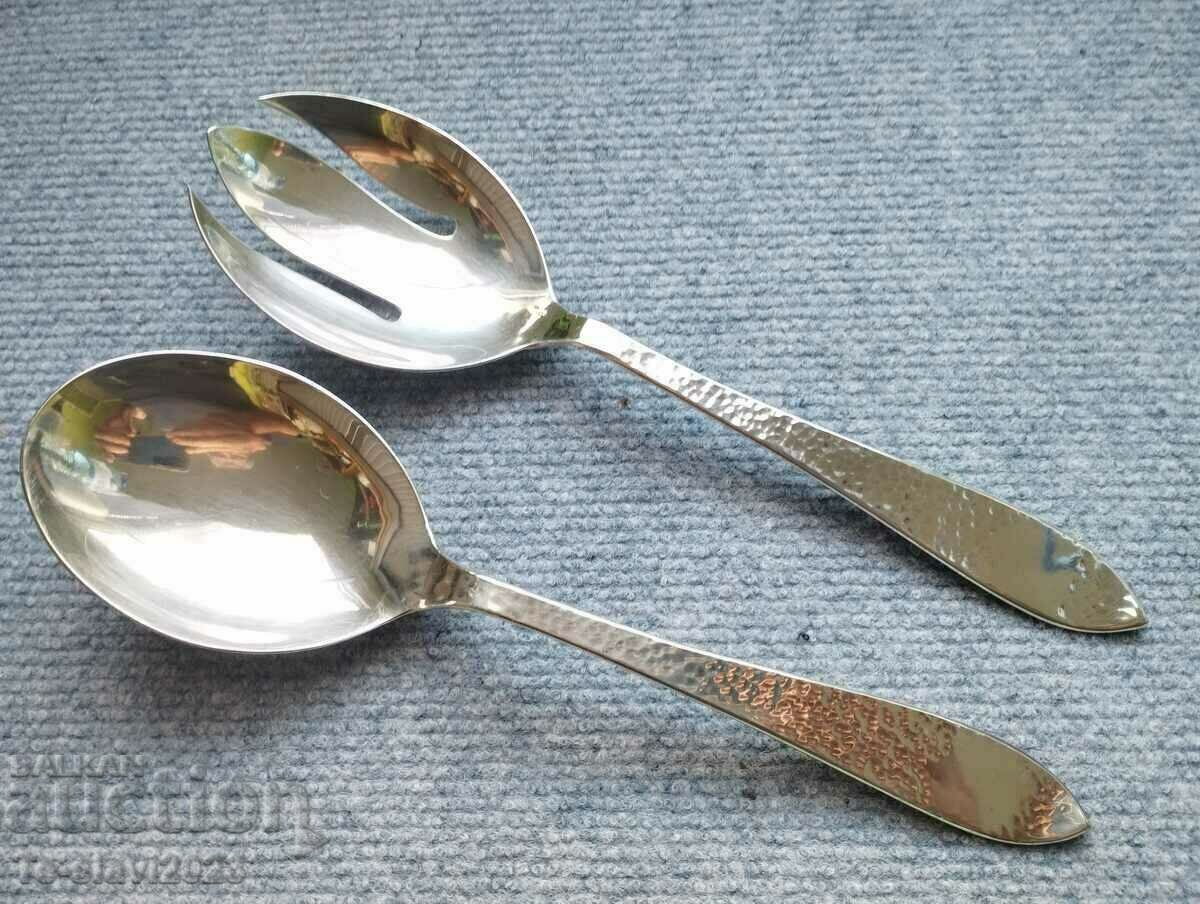 Silver fork and spoon for serving salad