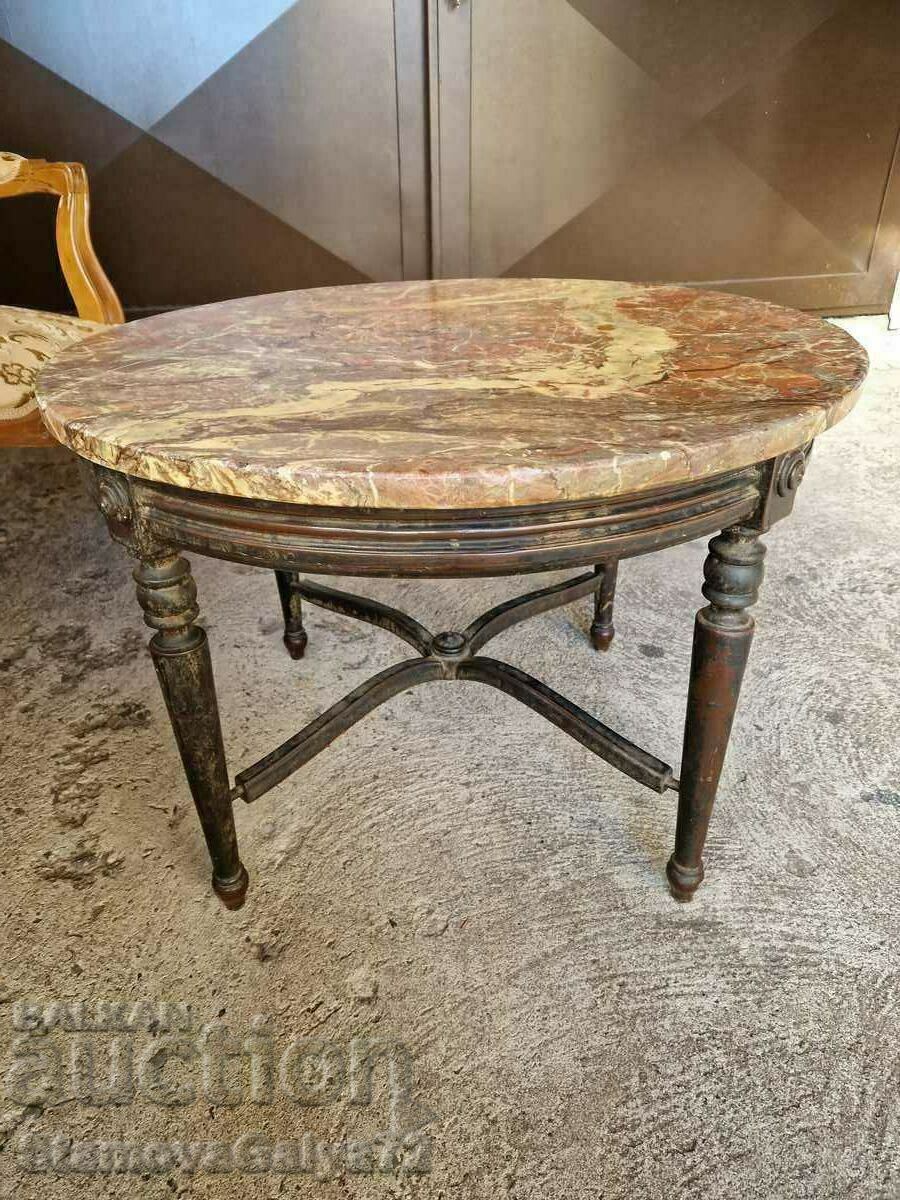 Delivery of A great antique solid wood coffee table with a marble top Delivery of A great antique solid wood coffee table with a marble top