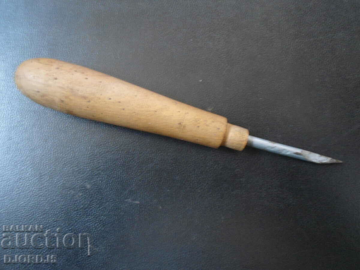 An old carpentry tool, a chisel