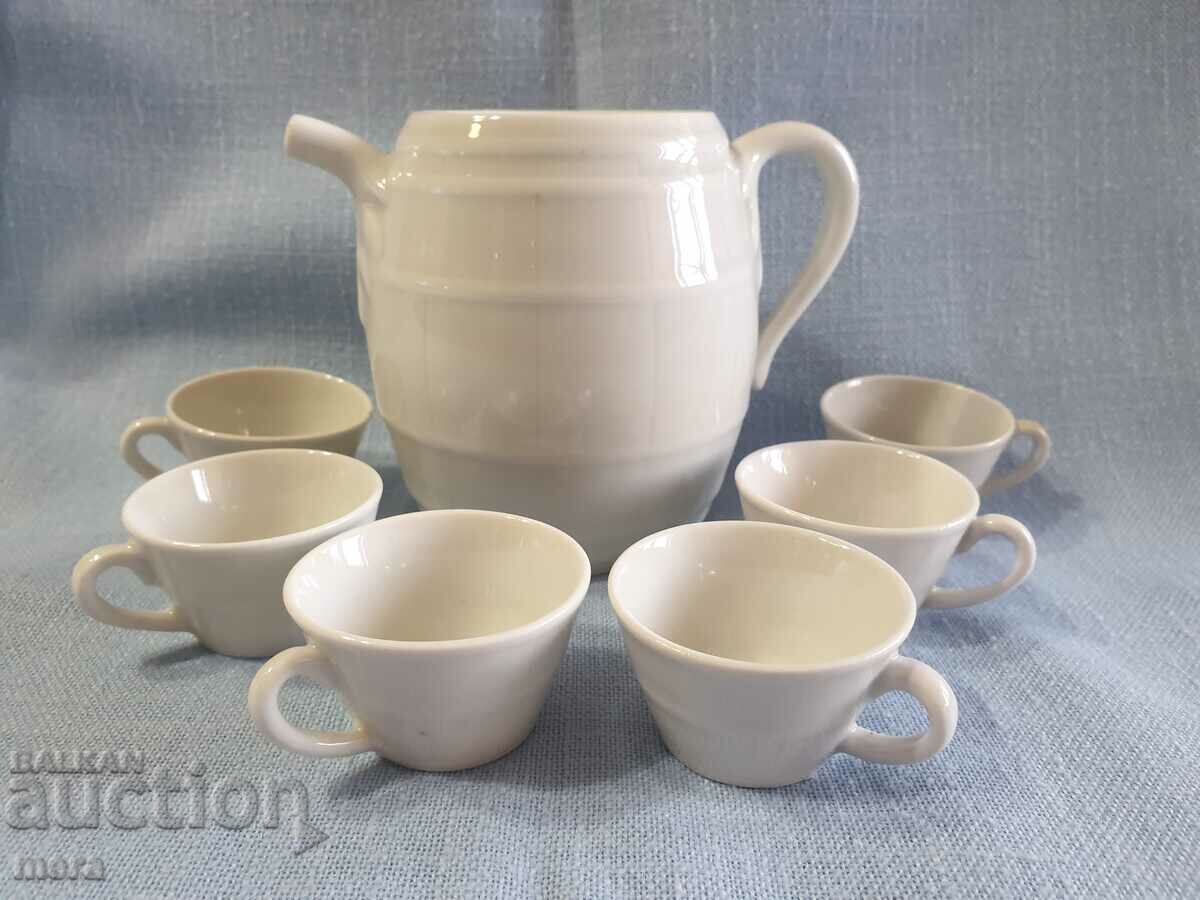 Auction Porcelain service for heated brandy Auction Porcelain service for heated brandy