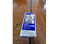 Alarmă personală veche