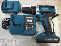 Cordless drill "Makita" with batteries and charger working