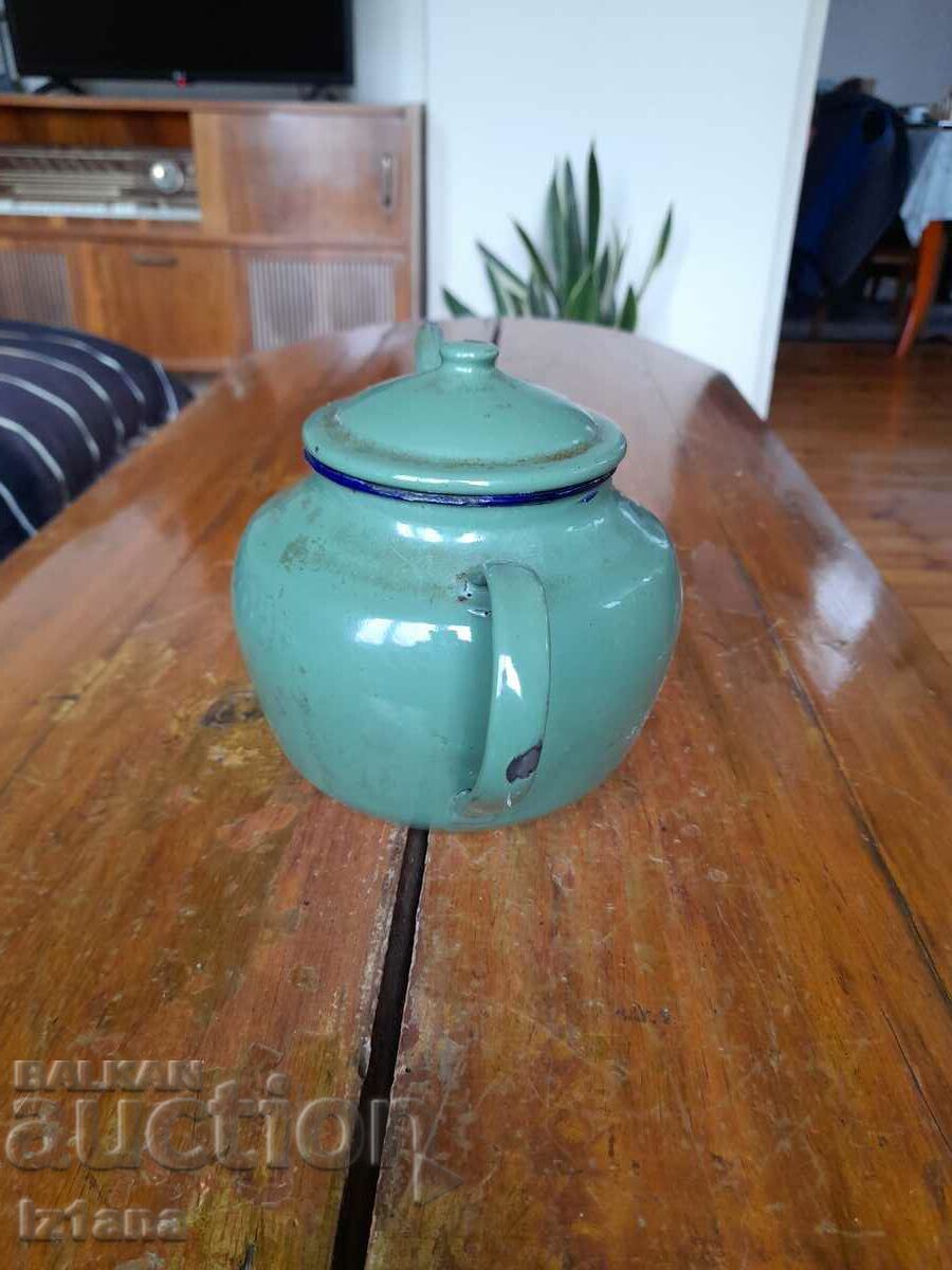 Delivery of Old enamel teapot