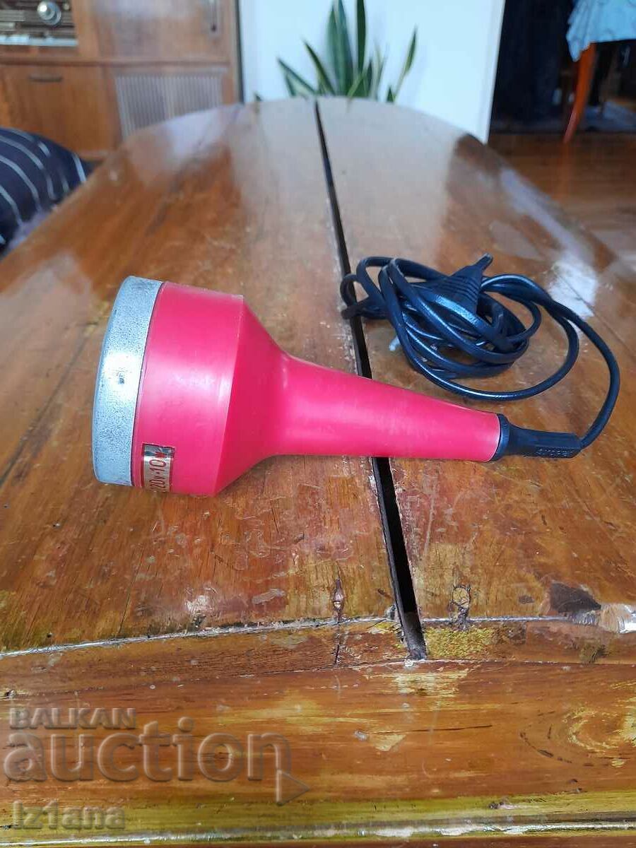 An old cosmetic device An old cosmetic device