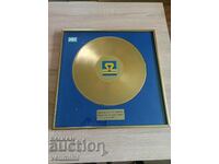 Gold plaque in frame
