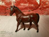 Old horse statuette figure