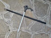 A cane with a hidden blade